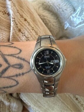 Citizen Titanium Eco-Drive Watch with Black Dial and Silver Bracelet